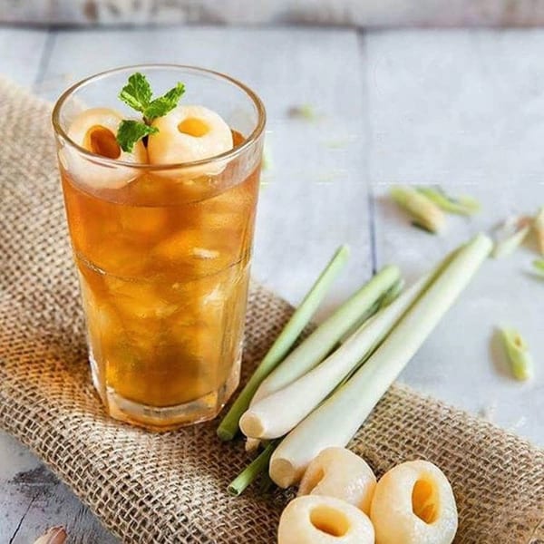Iced lychee tea with mint and lemongrass on a burlap mat at Pho 07 Vietnamese Restaurant.